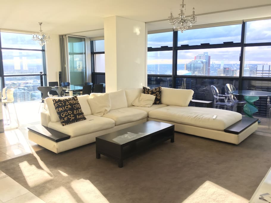 Large living room with amazing views of the city and Darling Harbour