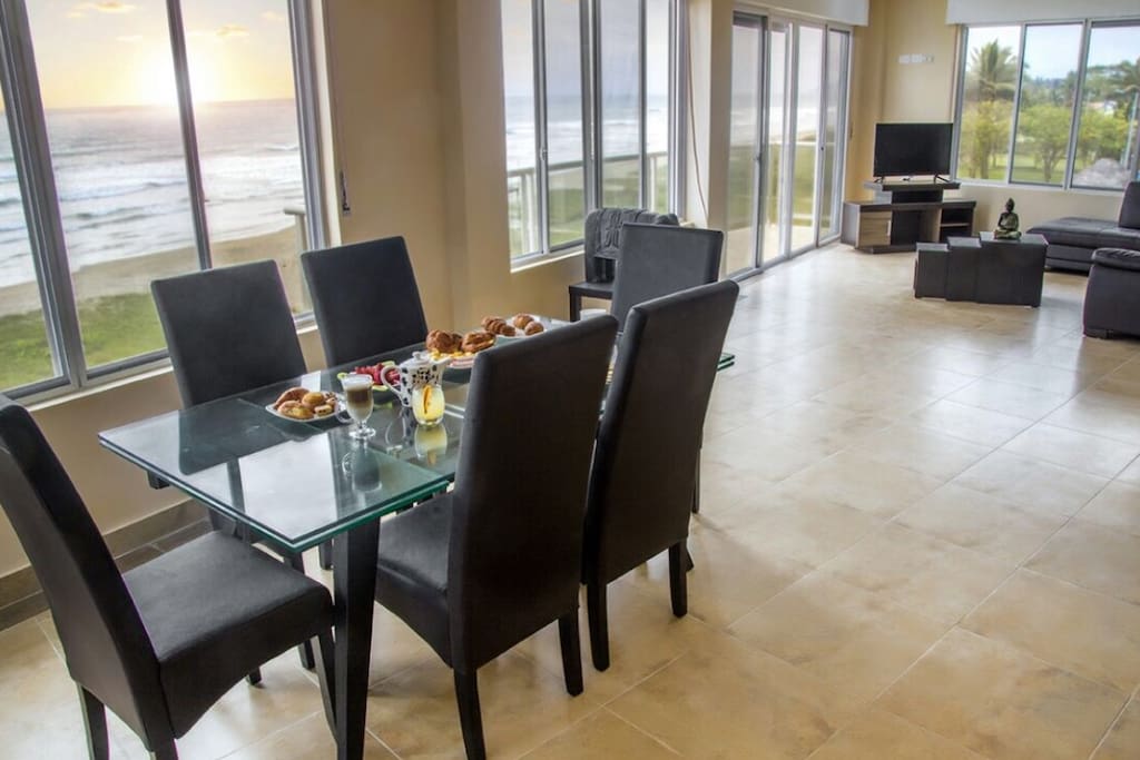 Dining and living room with panoramic ocean view. 180 degrees of the most incredible view.