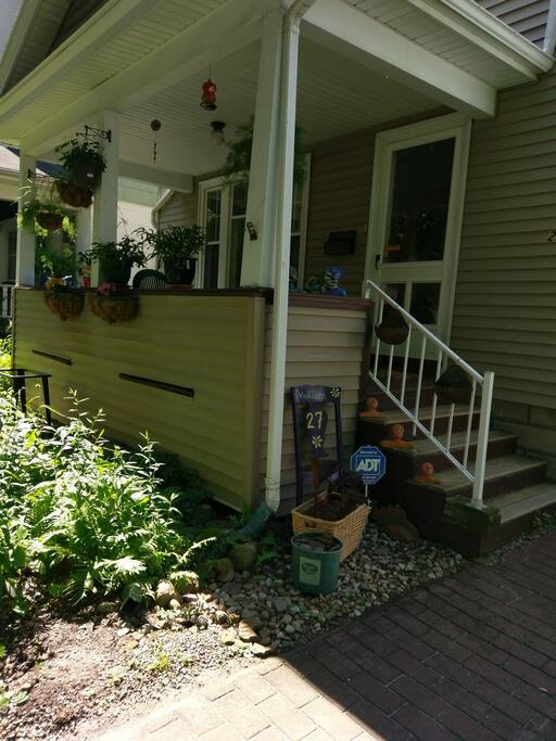 front porch with old railing, the new one is way better.
