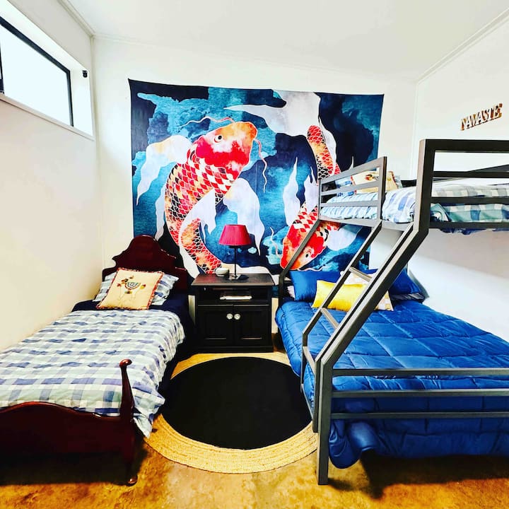 Seperate bedroom with 2 single beds and one double bed - great for families - pop the kids to bed and enjoy the studio apartment to yourself. 
Small single stretcher or travel cot available for additional guests. 