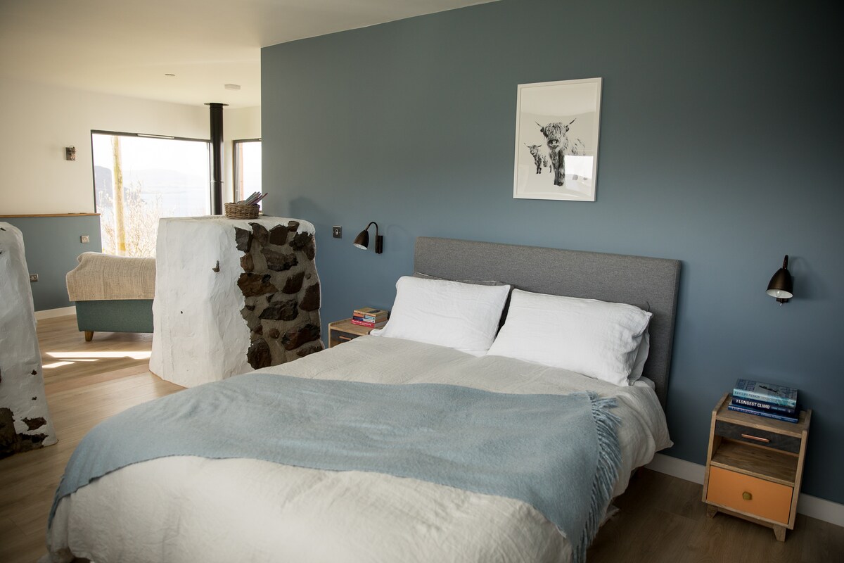 'NearByre' is a brand new conversion of an C18th cow barn, or 'byre'. This eco-friendly, custom built and beautifully designed apartment is the perfect place to relax and unwind. The original stone walls give a hint to its humble origins.