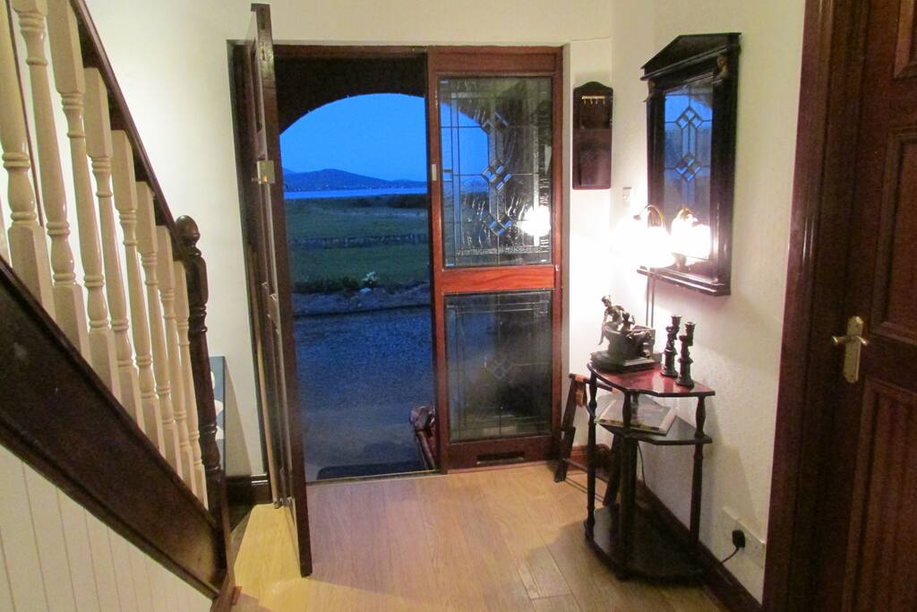 entrance hall leading up to 3 bedrooms