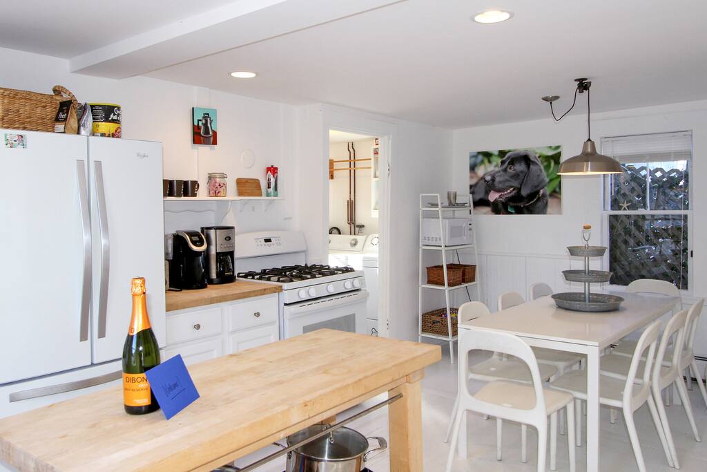 Savor home-cooked meals at the 8-person dining table.