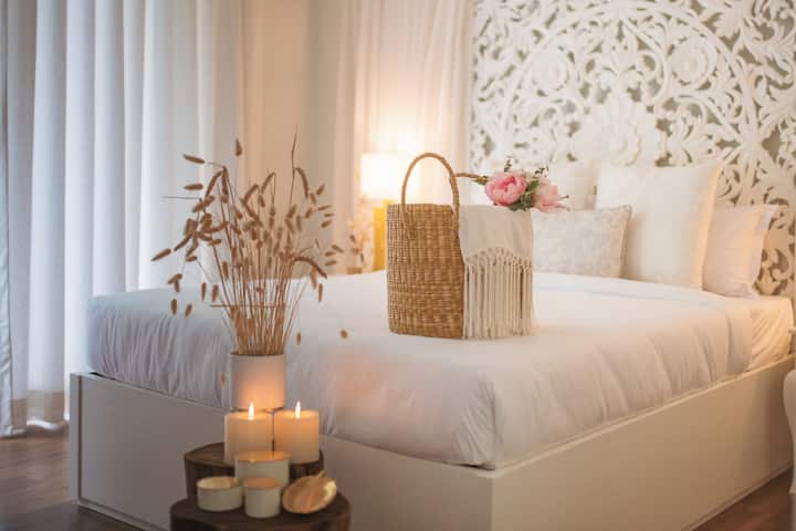Bedroom 2. We also call it the studio room. Just upon entering this all white bedroom, you are guaranteed to fall in love with it.