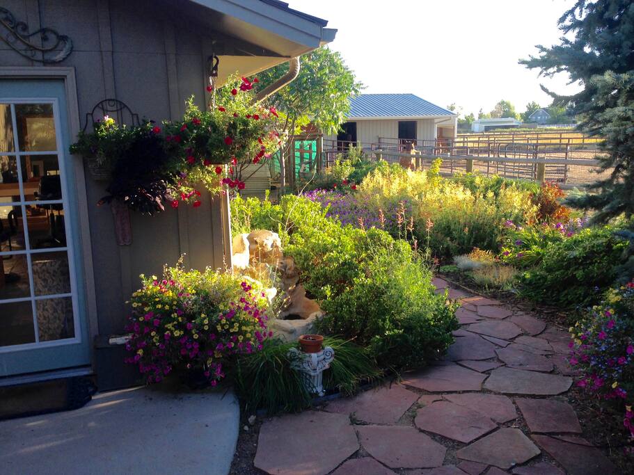 After parking, follow the flagstone pathway around back to the east to your mostly private entrance. It is well lit with motion detector and solar path lights at night.