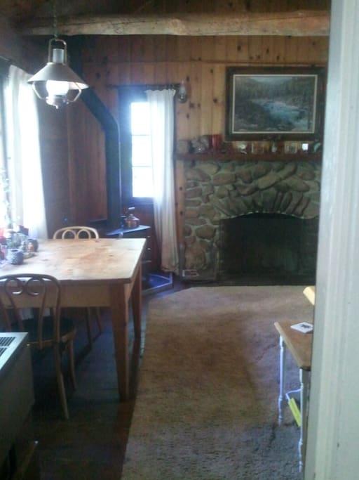from kitchen, natural stone fireplace, custom wood furniture