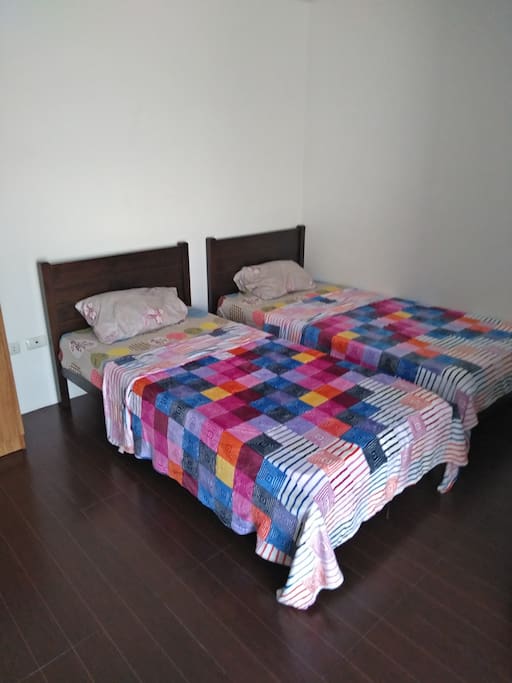 Two twin size beds and can also be joined together for a single queen sized bed