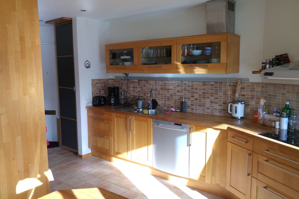Kitchen with all necessary equipment such as stove, dishwasher, pots and pans etc.