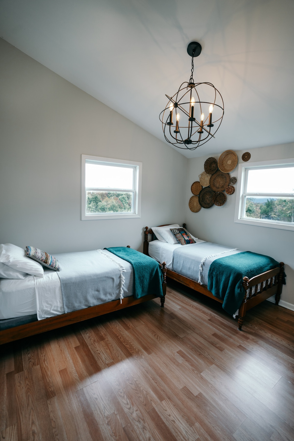 Two twin beds in the downstairs bedroom