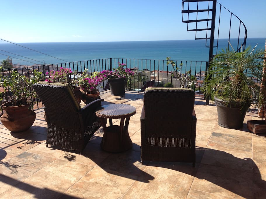 Sun-drenched open deck outside dining room