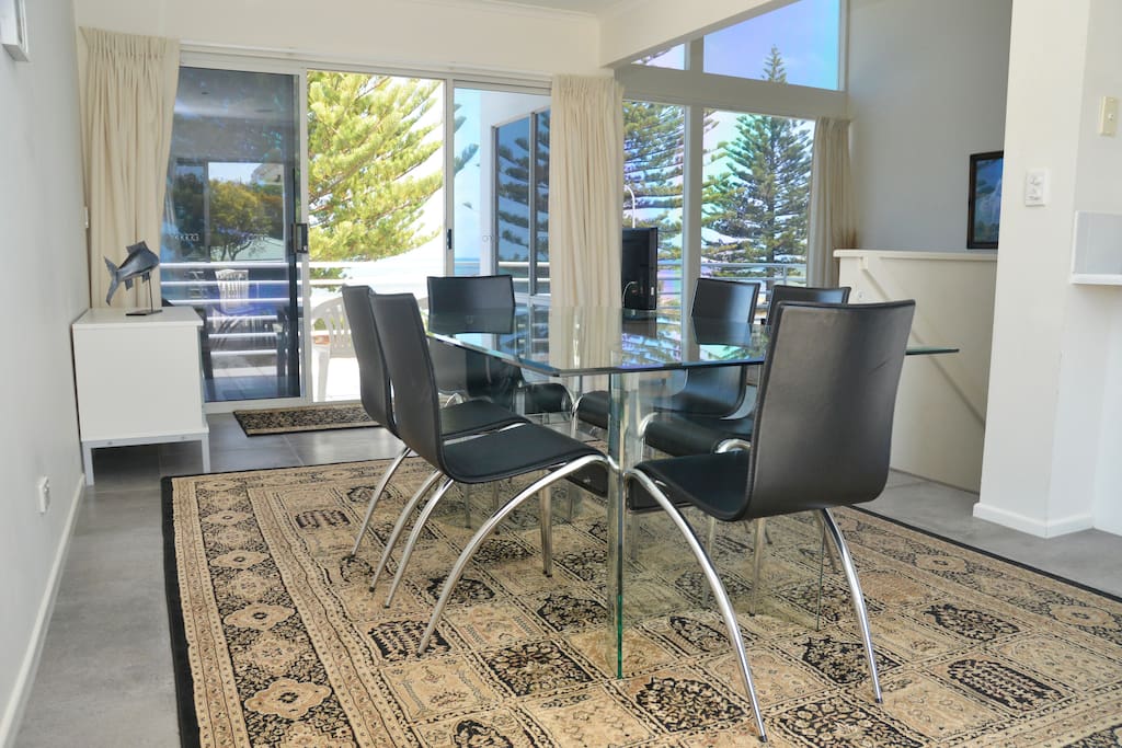 Each townhouse has a spacious dining and living area with sea views