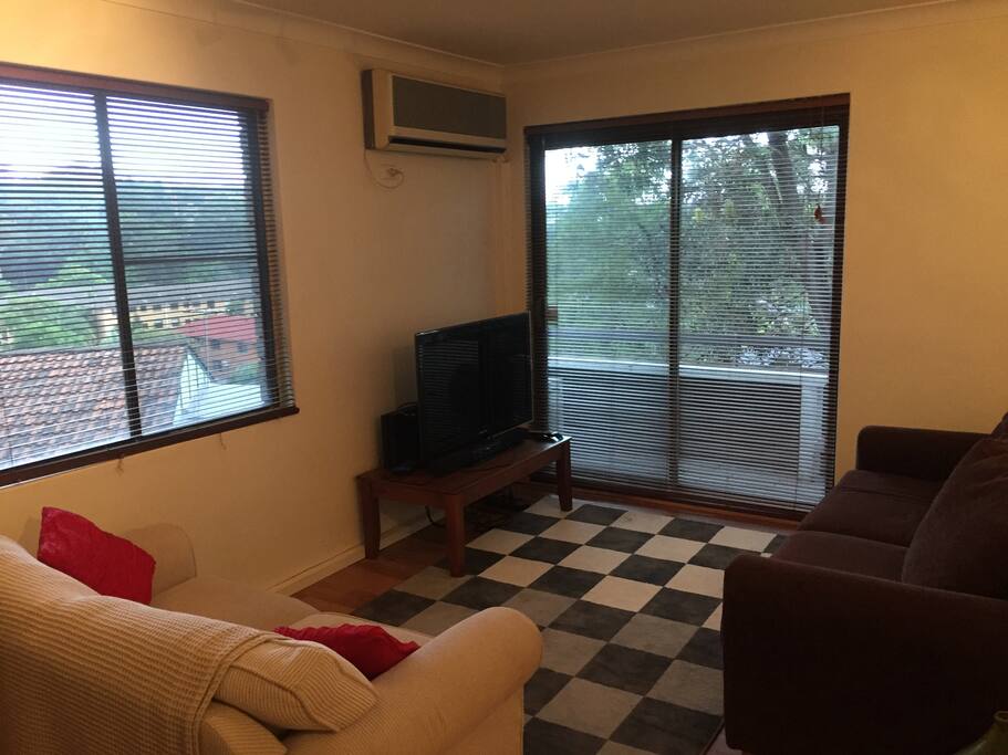 Comfortable living area with balcony