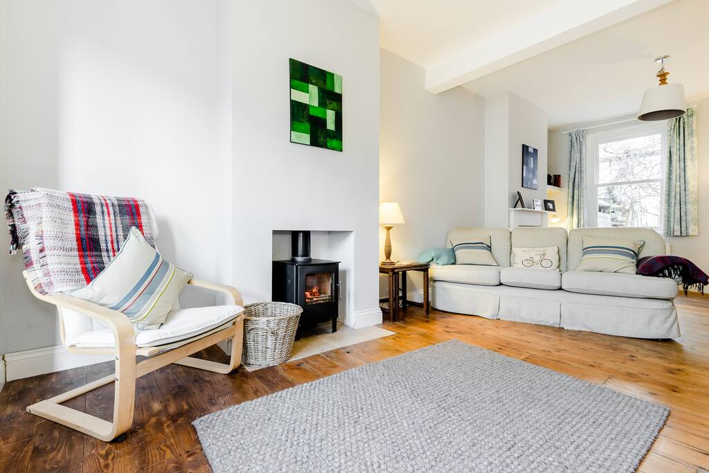 Lounge complete with contemporary log burner