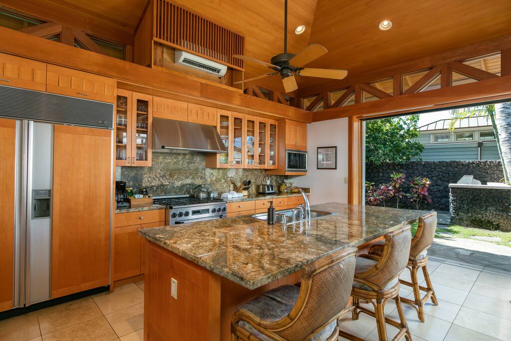 Large gourmet kitchen - stocked with spices and oils