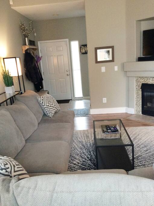 Cozy sectional as soon as you walk through the door.