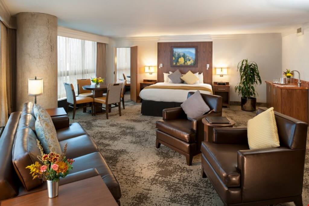 Take a seat in one of the plush chairs, or plan your day at the dining table.