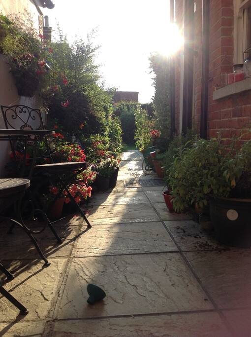 View down the garden from bedroom and dining room