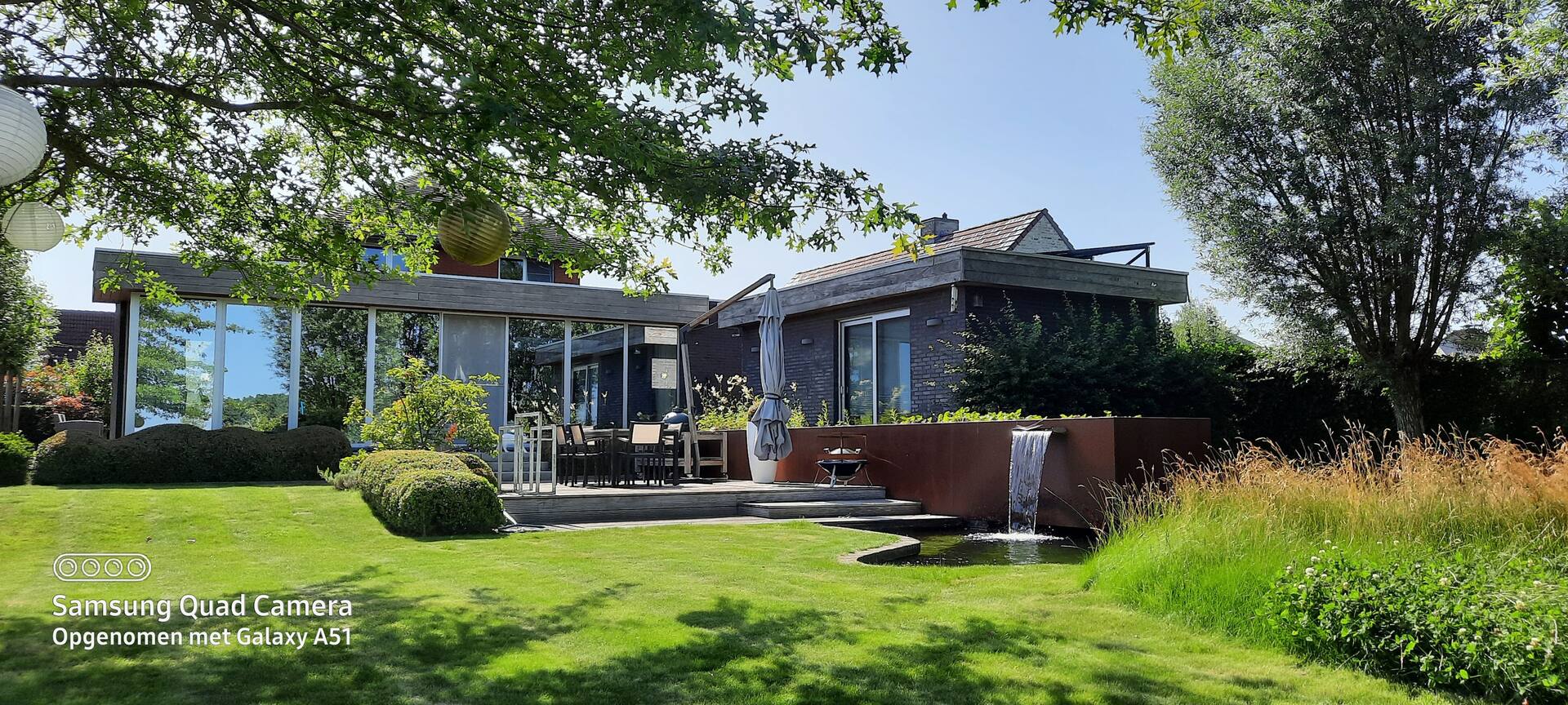 Modern villa with sun terrace and swimming pond