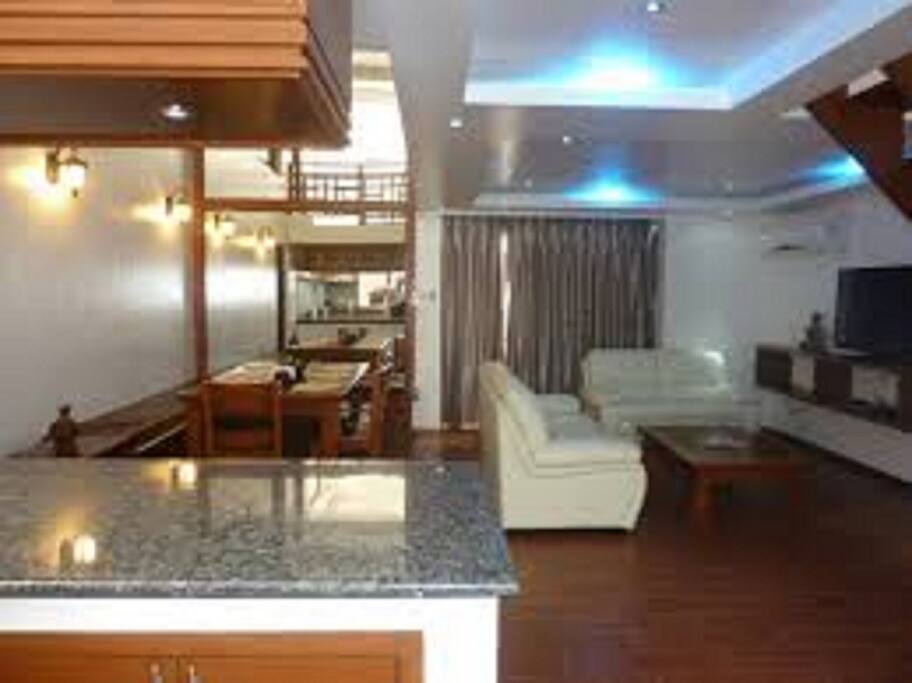 LIVING ROOM AND KITCHEN AREA