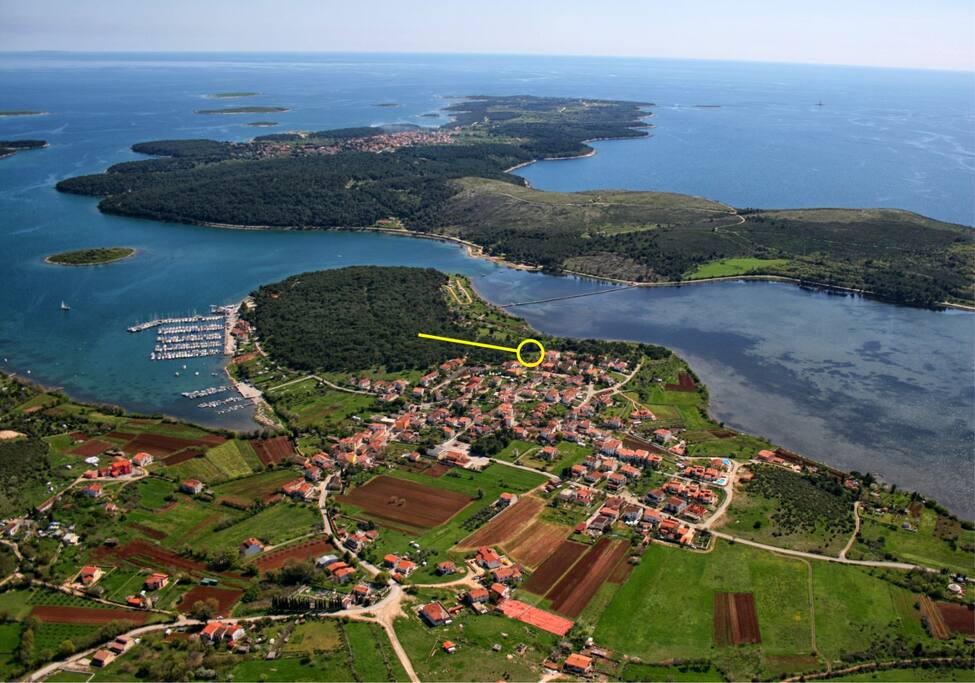 Aerial view of Pomer and house location