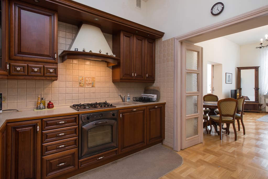 kitchen looking onto living room and dining area