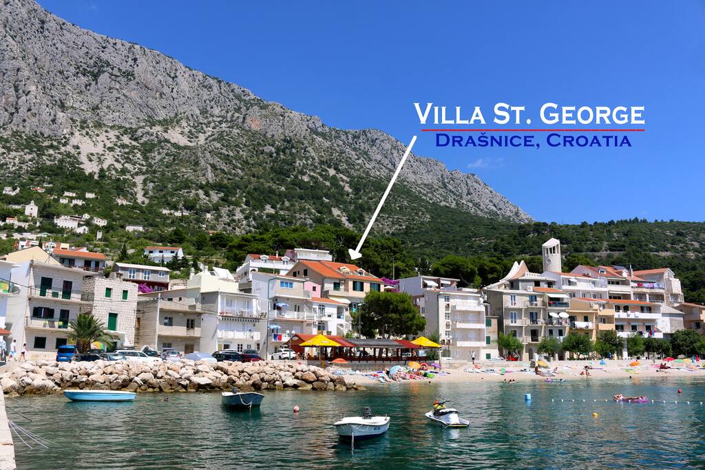 Villa St. George Apartments are on the top two floors of this building with the red roof, just 50 meters from the sea