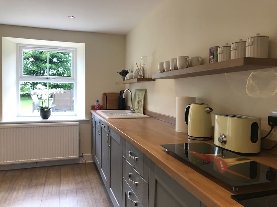 The kitchen looking onto the private garden