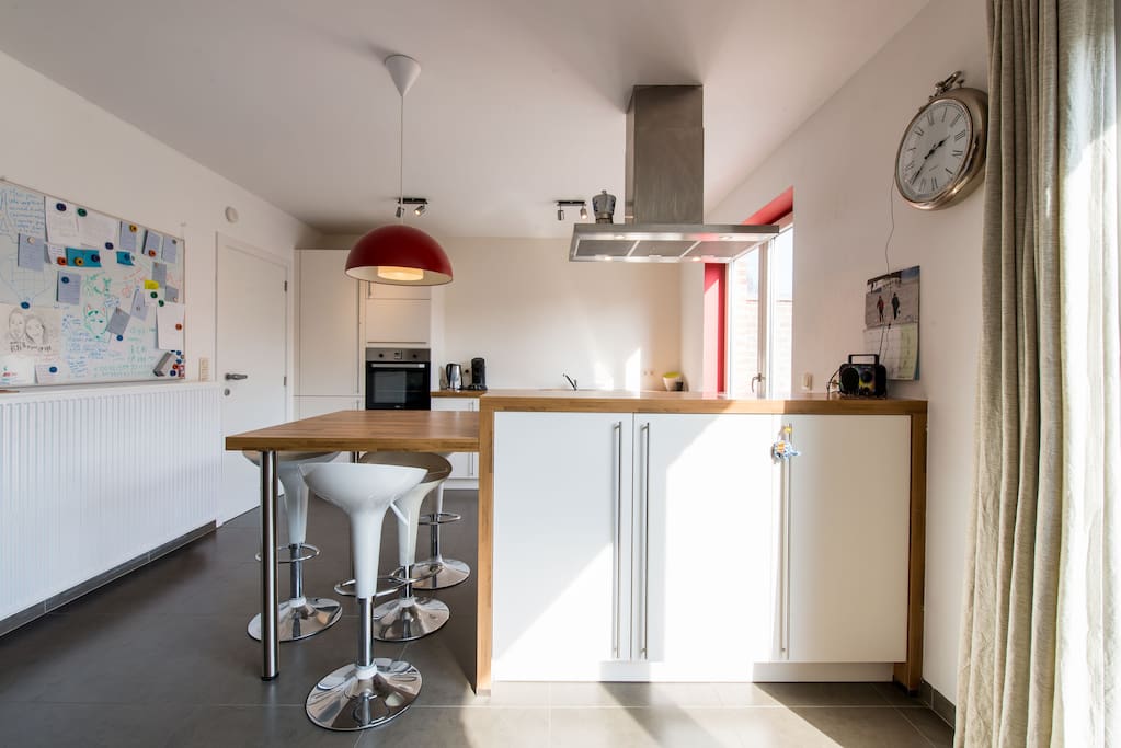 The fully equipped kitchen is ready for usage.