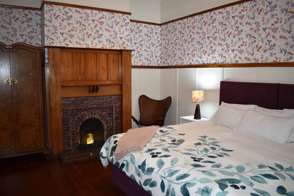 Master bedroom with original character features and super king size bed that can be split in to 2 long single beds.