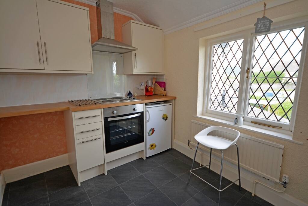 Residents kitchen, fridge & cooking facilities.