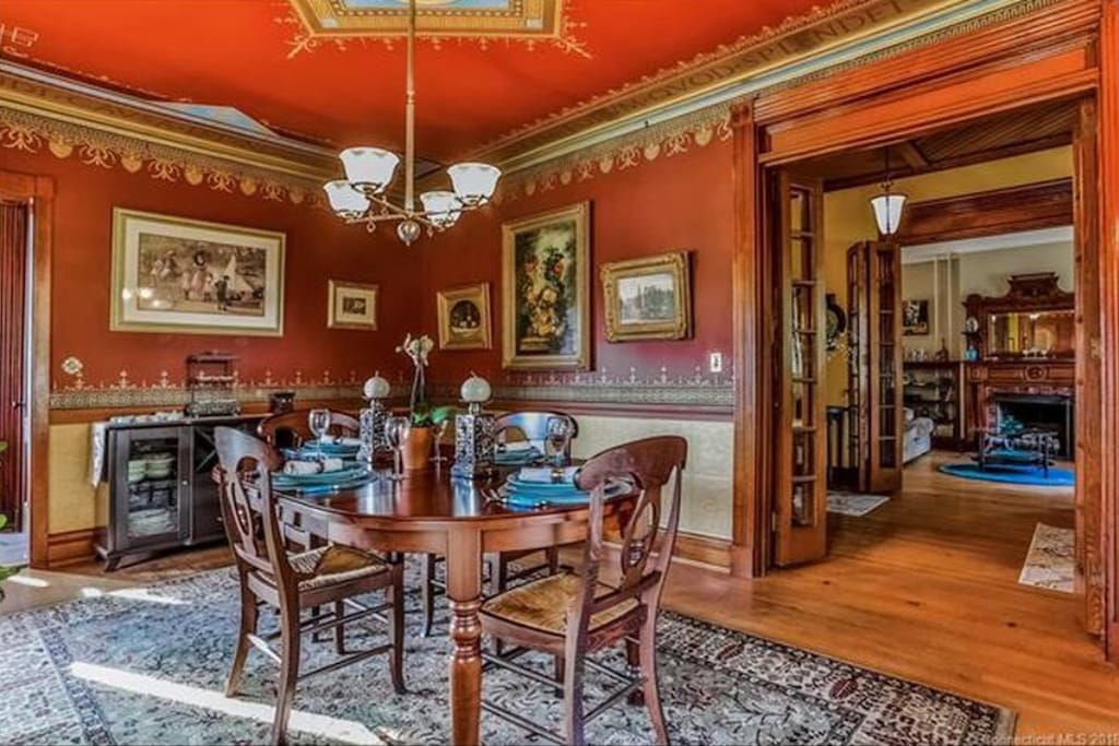 Dining room now has a large table for 12 but this was a great photo from before we moved in