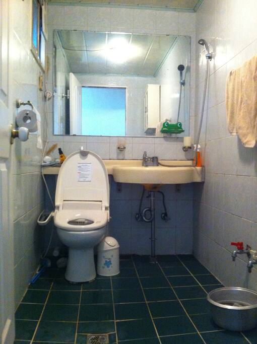 A bathroom with a shower.