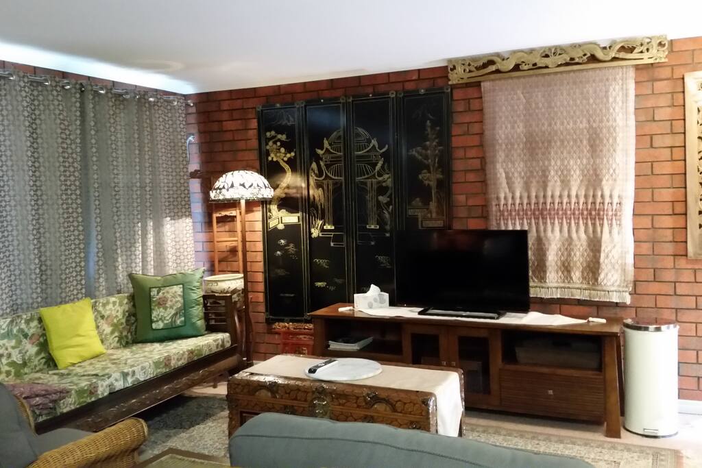 Large TV and extra sofa