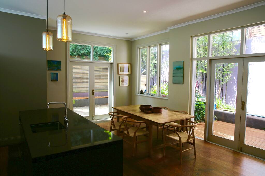 Kitchen, dining area opening onto garden/deck