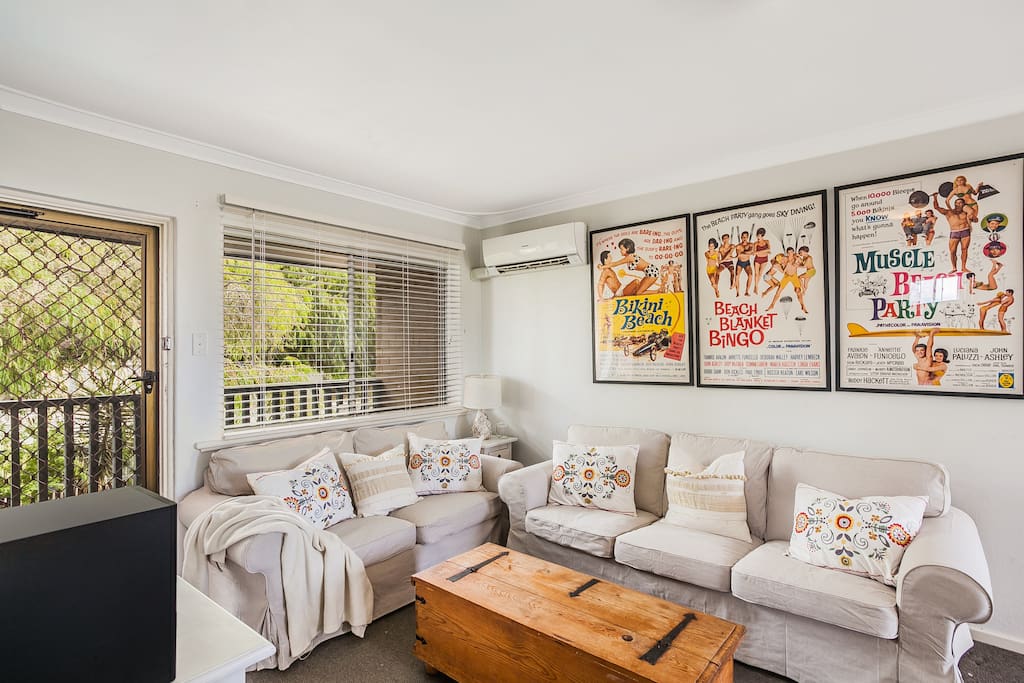 Sitting room for 5 - enjoy sound bar, wifi and flat screen TV and balcony with bench to appreciate the peppermint tree aspect