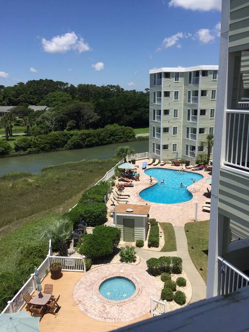 2nd pool and hot tub on property , this is your beautiful view out your balcony to your right. Then you have the ocean bay strait ahead with the ocean view beside it. With these 3 views off of your balcony you will be mesmerized with beauty in every direction you look !