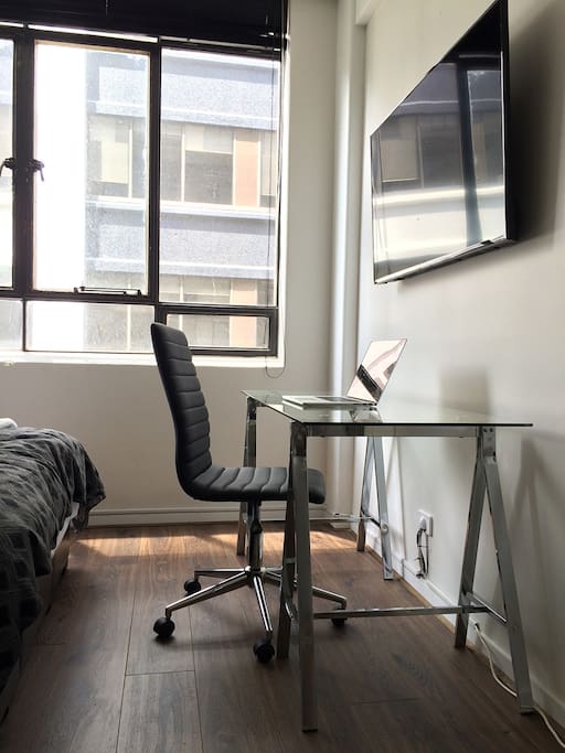 Desk and TV with Xbox, Apple TV and Netflix.