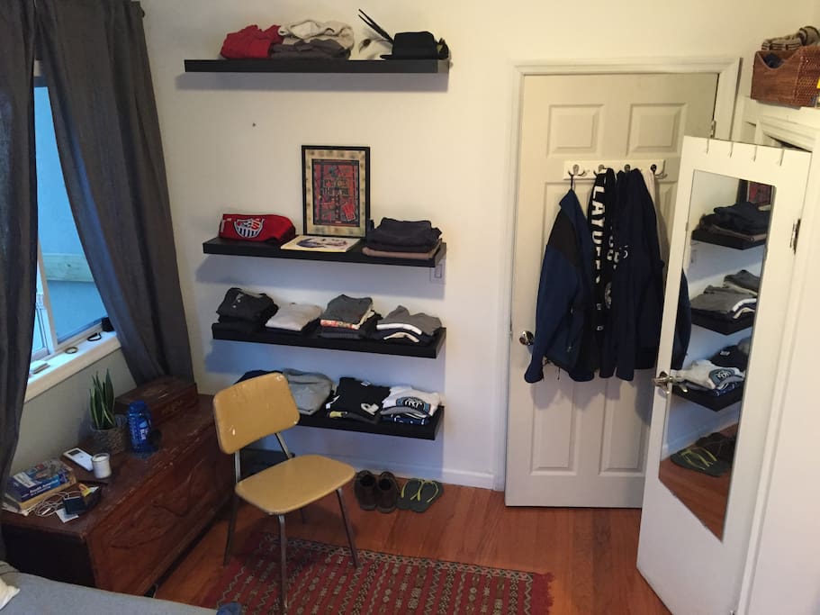 Bedroom - shelves, closet and antique wood chest