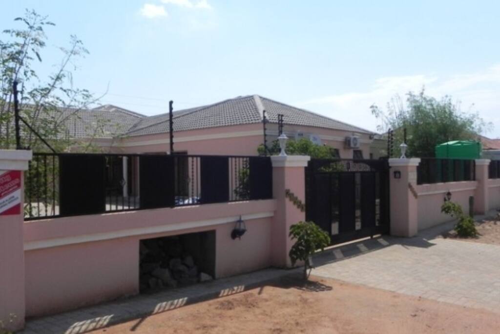 Whole house screen-walled, electric fence, security system and air-conditioned.