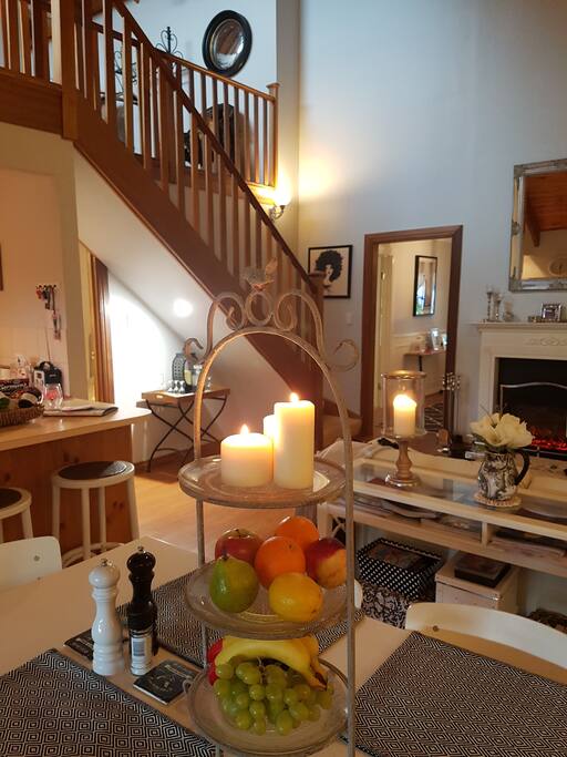 Dining, Living, stairs up to Mezzanine Balcony Suite