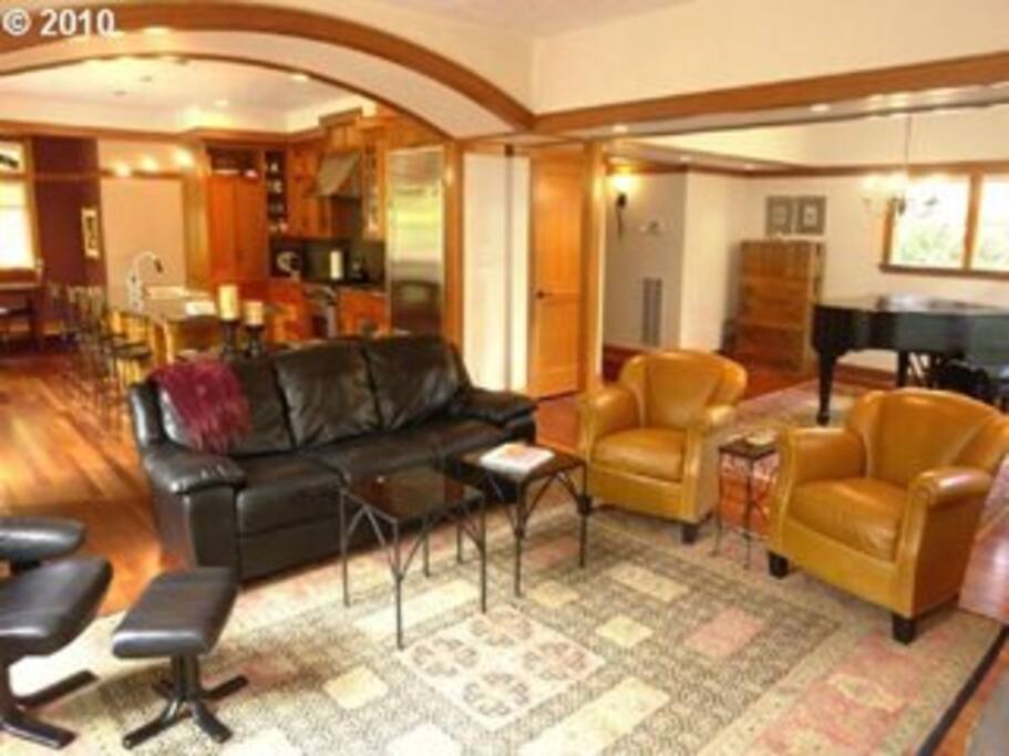 Wood flooring and moldings bring a warm, comfortable feeling to this house surrounded by Douglas firs
