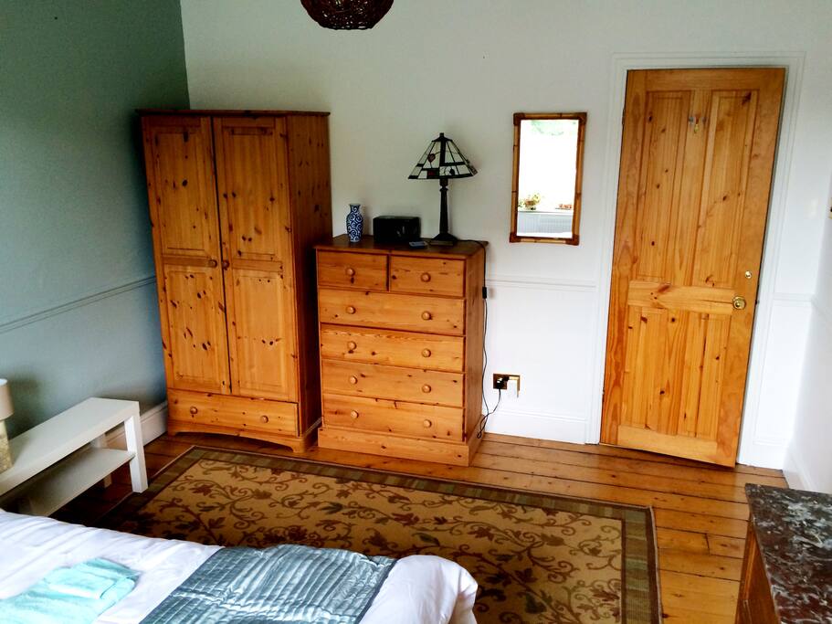 Wardrobe and drawers for guest use; the WiFi router is plugged in here, so the signal is excellent - as long as it remains plugged in!