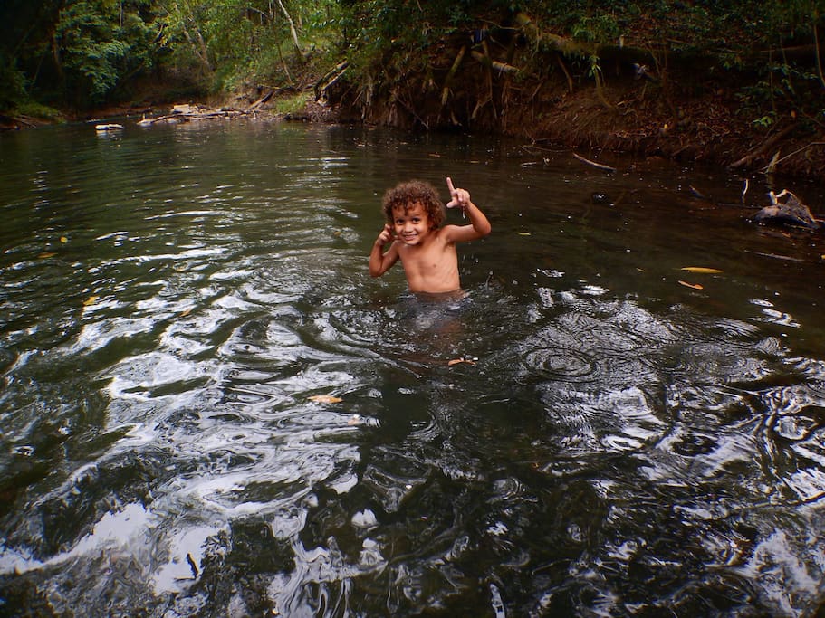 My son (age 4) cooling off in the river. It's spring -fed, cold, and refreshing.