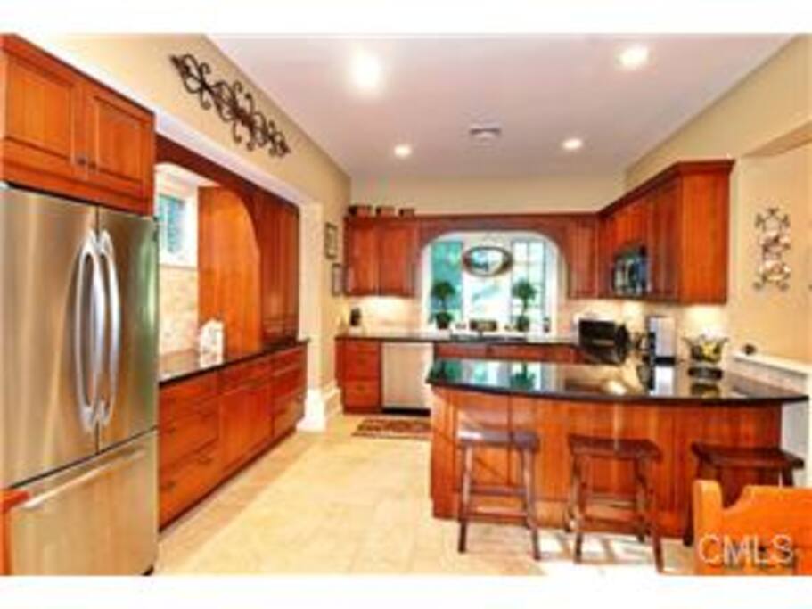 Kitchen with Granite Countertops and Stainless Steel Appliances