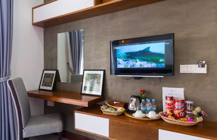 writing desk, tea and coffee and amenities like this for every room