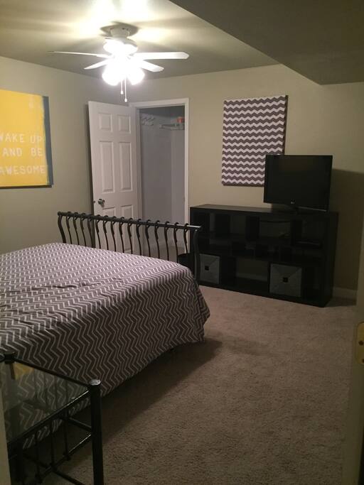 Bedroom is large enough for two adults. Walk-in closet and private restroom entry.
