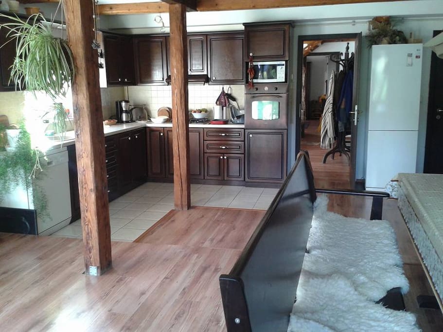 the Kitchen can be used for taking breakfast or having a glass of wine in the evening. It has a wide window towards the hills and the citadel.