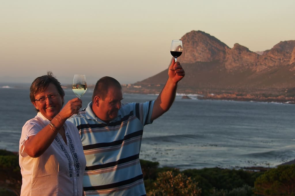 Celebrating life on the deck with a view towards Klein Hangklip Mountains