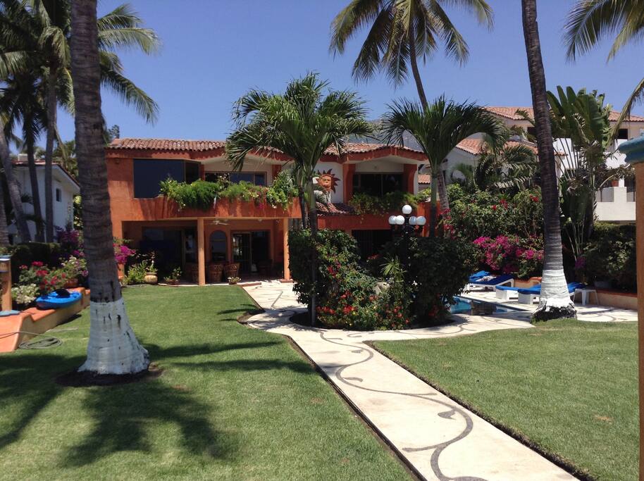 Another photo from the back. A little garden and waterfall shades some of the pool area to keep swimmers and readers cool.