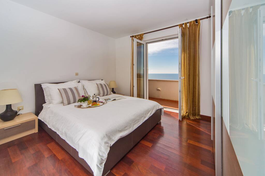 Master bedroom opens onto balcony